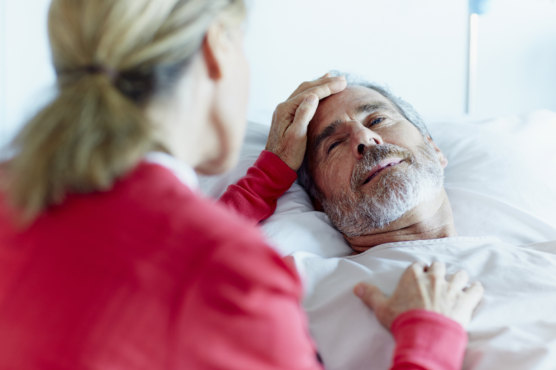 male-pt-in-bed-iStock-493216257